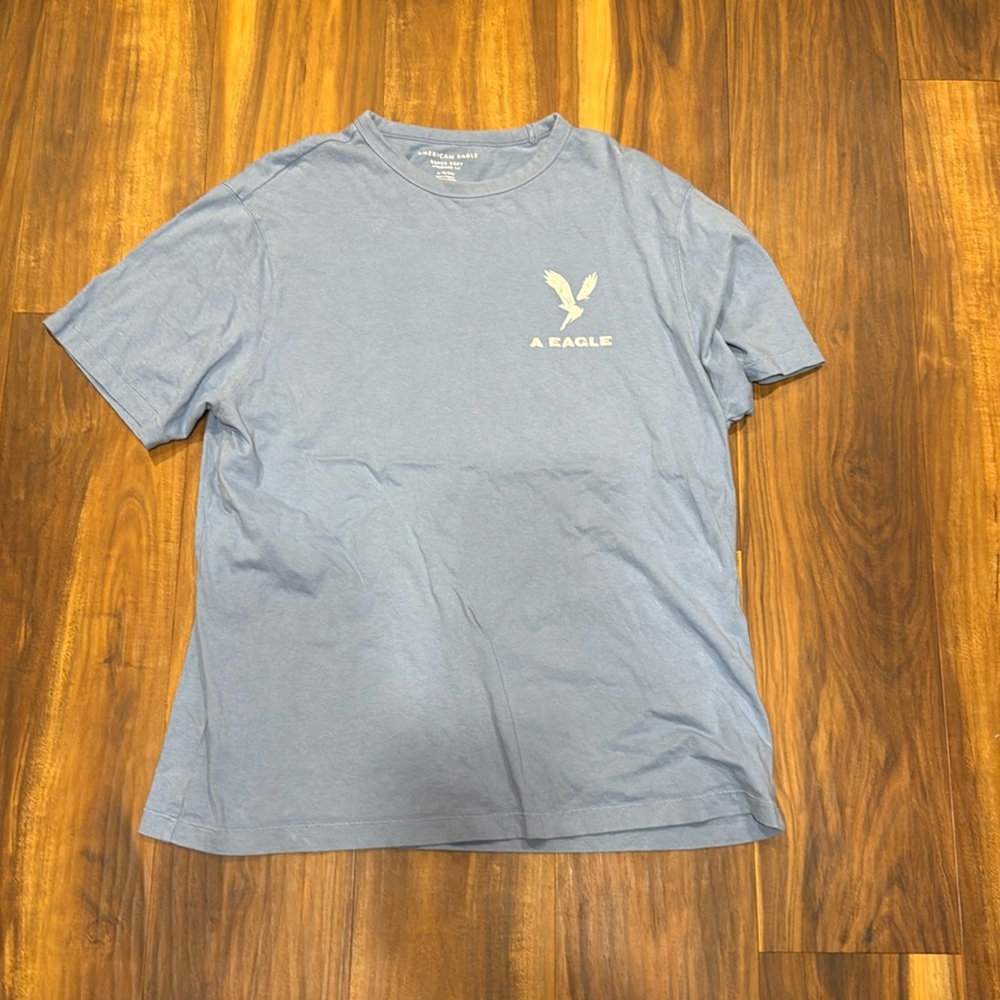 Light blue Ultra soft American eagle shirt.